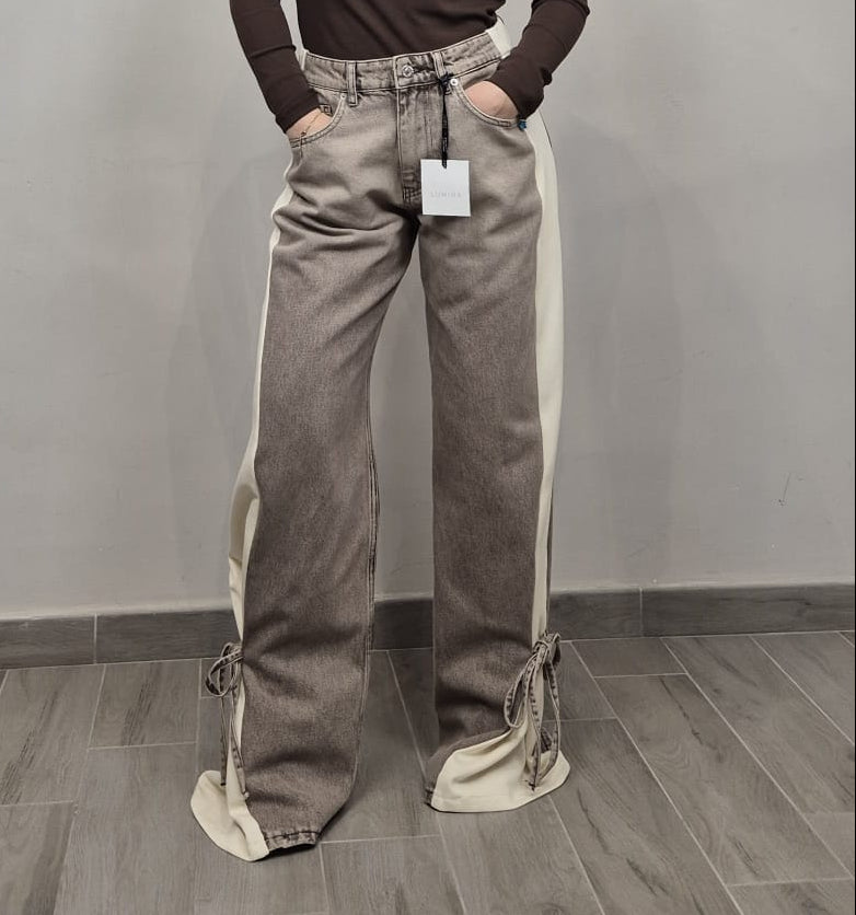 Jeans donna a gamba larga bicolore beige e crema con lacci sul fondo, stile casual